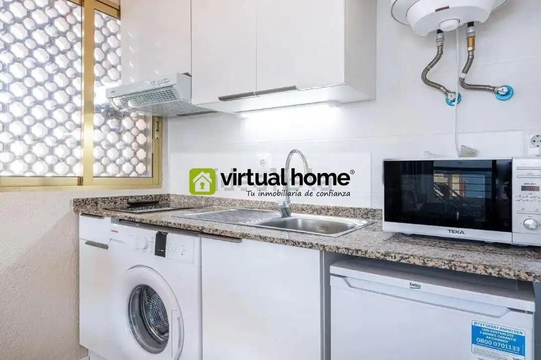 Kitchen of Flat for sale in Benidorm  with Air Conditioner, Terrace and Furnished