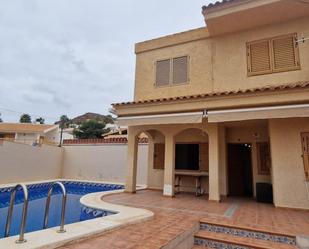 Vista exterior de Casa adosada en venda en Águilas amb Aire condicionat, Terrassa i Balcó