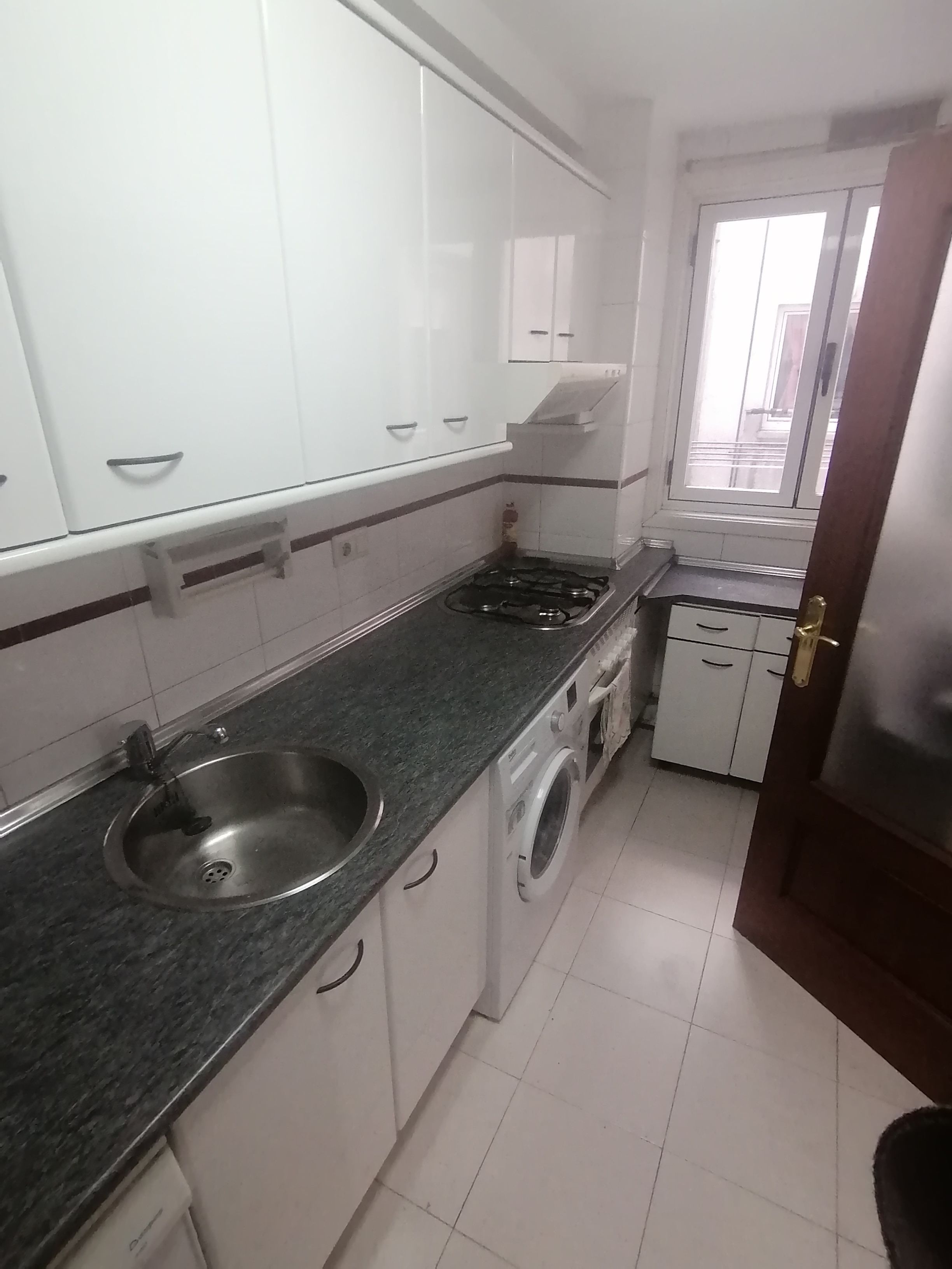 Kitchen of Apartment to rent in Gijón   with Heating, Parquet flooring and Storage room