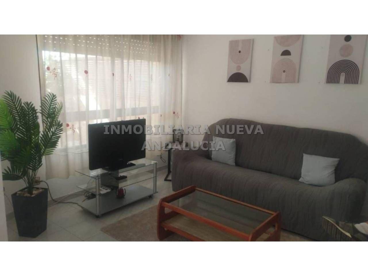 Sala de estar de Casa o chalet de alquiler en  Almería Capital con Terraza, Amueblado y Piscina comunitaria