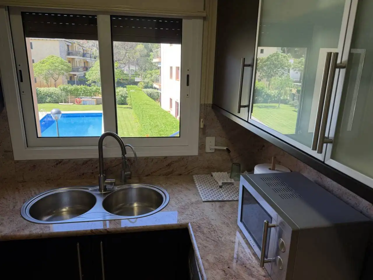 Küche von Wohnungen zum Verkauf in Castell d'Aro, Platja d'Aro i s'Agaró mit Klimaanlage, Heizung und Terrasse