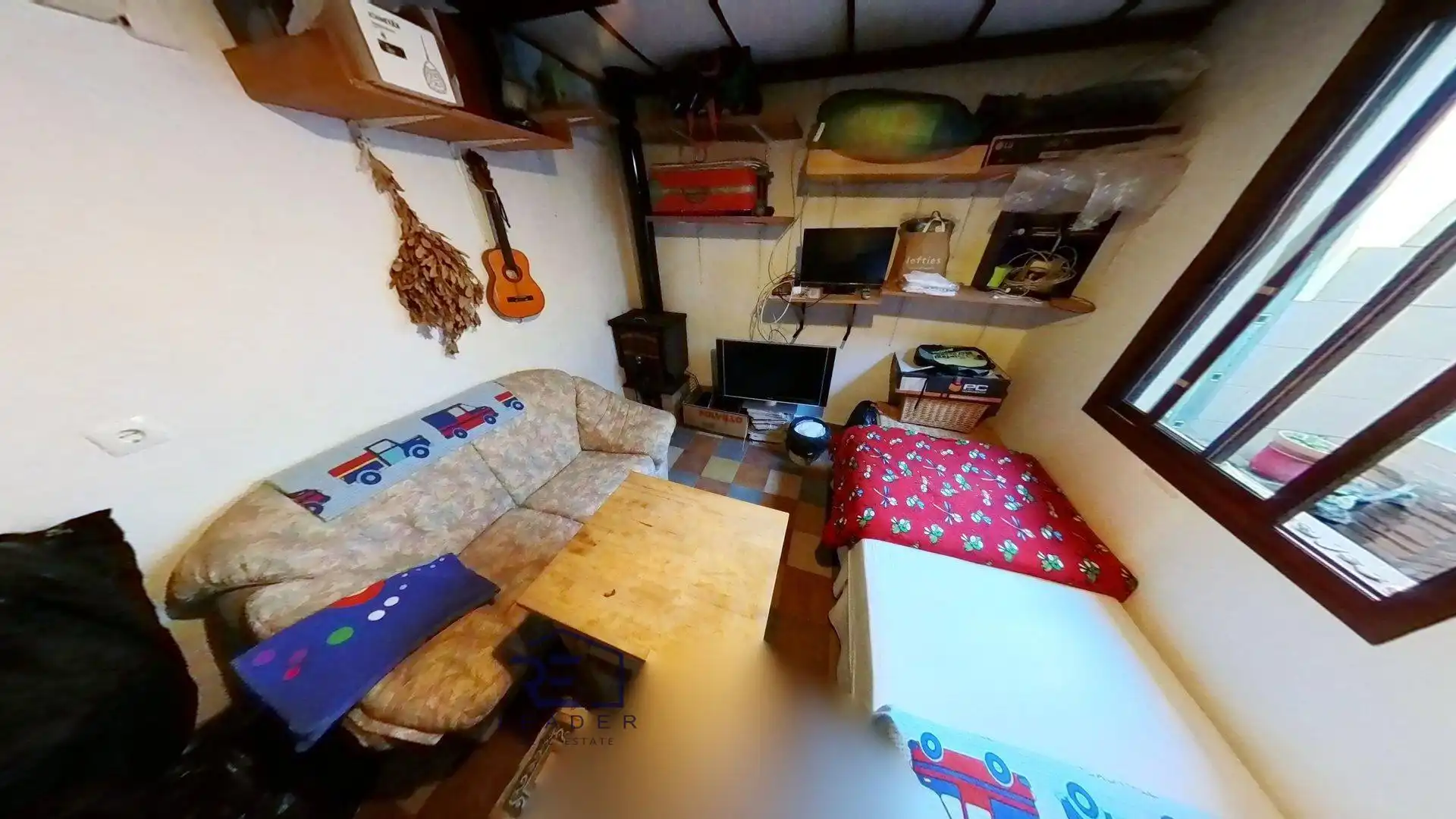 Sala de estar de Casa adosada en venta en Guillena con Aire acondicionado, Terraza y Trastero