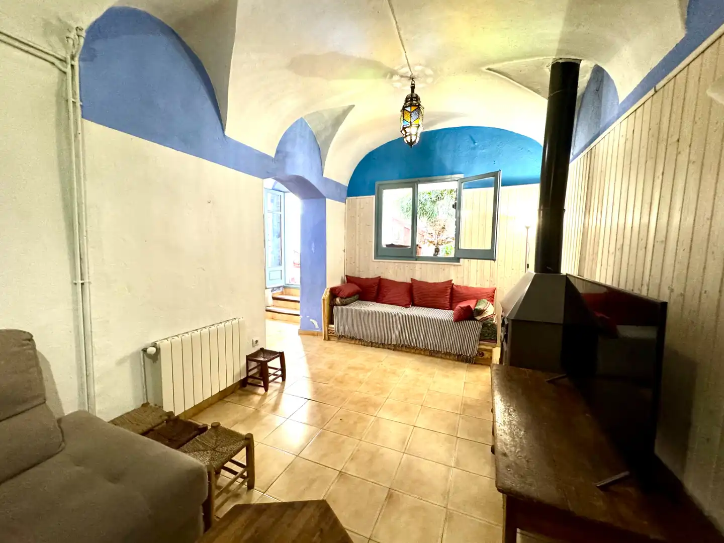 Sala d'estar de Casa adosada en venda en Sant Feliu de Guíxols amb Calefacció, Jardí privat i Terrassa