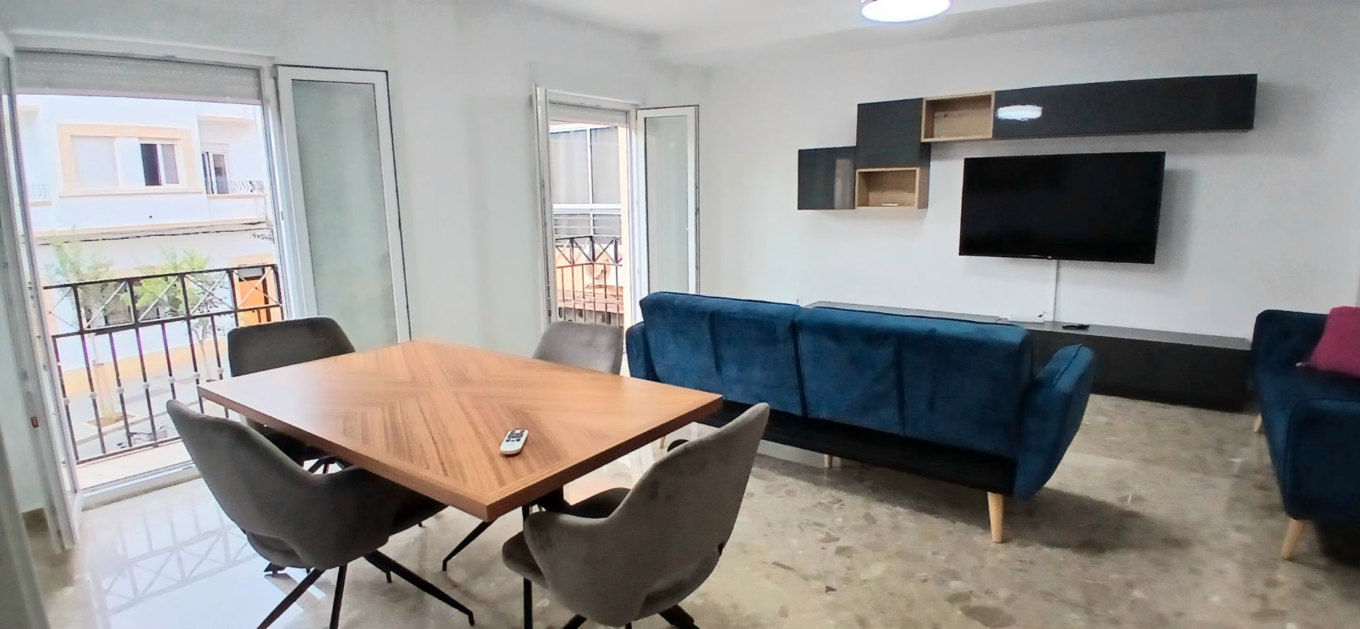 Sala d'estar de Casa adosada per a compartir en  Almería Capital amb Traster, Moblat i Forn