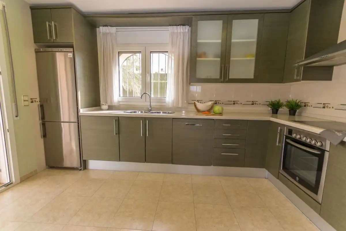 Cocina de Casa o chalet en venta en L'Ampolla con Aire acondicionado, Jardín privado y Terraza