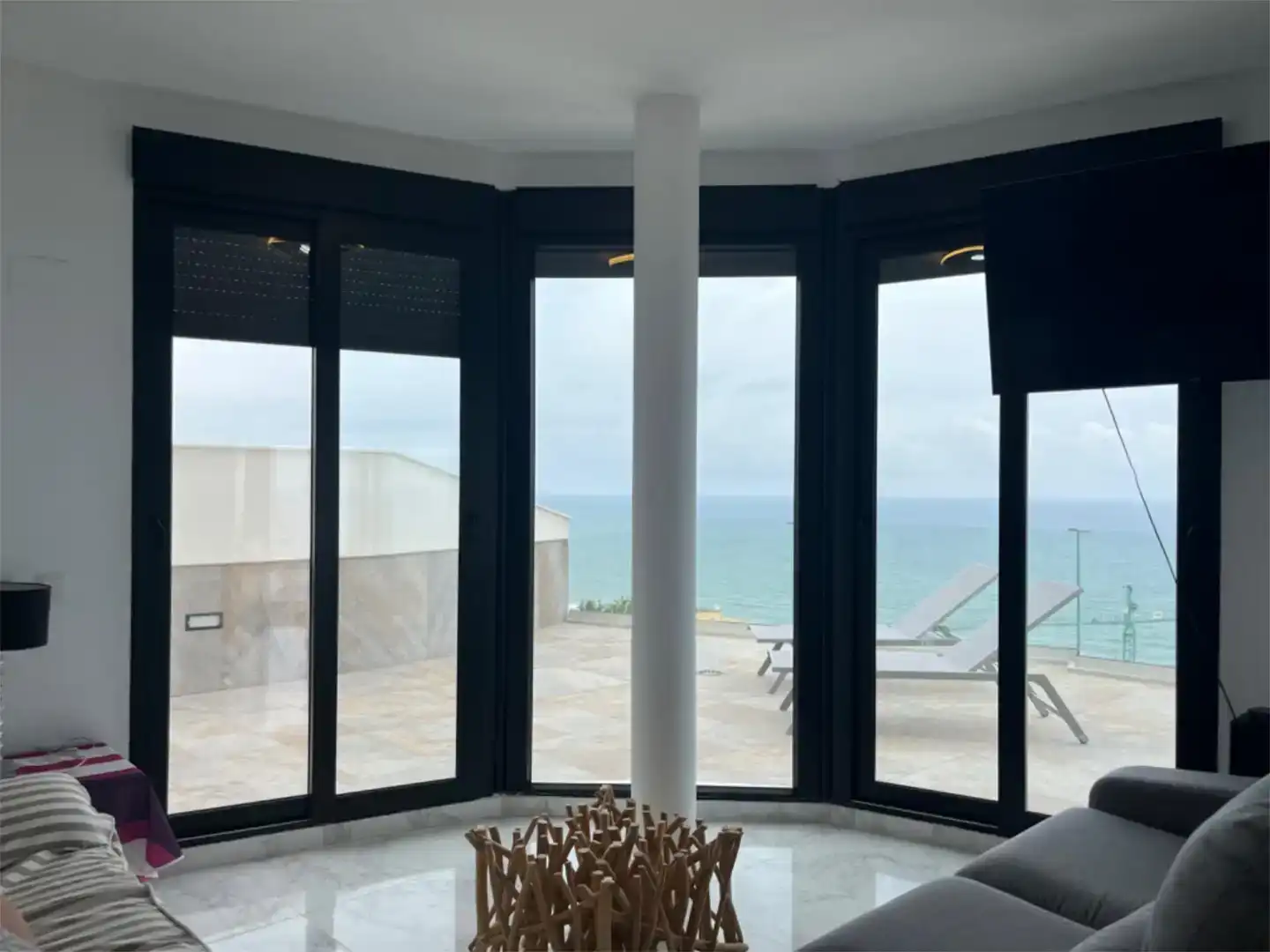 Sala d'estar de Casa adosada de lloguer en Cullera amb Aire condicionat, Piscina i Balcó
