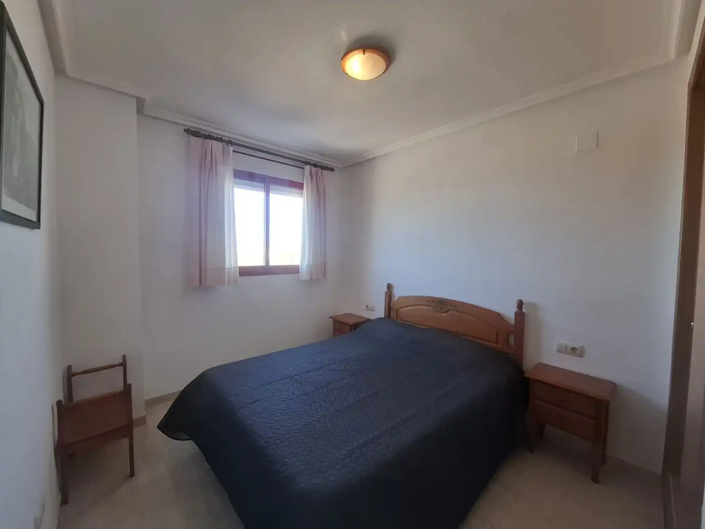 Dormitori de Pis de lloguer en Villajoyosa / La Vila Joiosa amb Aire condicionat, Terrassa i Piscina comunitària