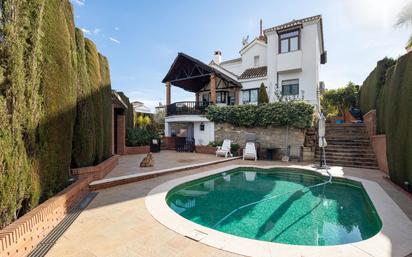 Vista exterior de Casa o xalet en venda en Otura amb Aire condicionat, Terrassa i Piscina