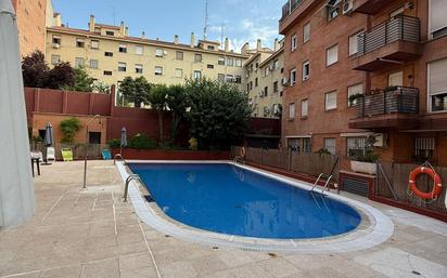 Swimming pool of Flat for sale in  Madrid Capital  with Air Conditioner, Heating and Parquet flooring