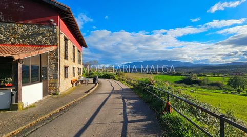 CASA RÚSTICA EN MADERA Y PIEDRA CON UN TERRENO DE UNOS 3.800m2 EN EL PUEBLO DE LUCES, LASTRES.