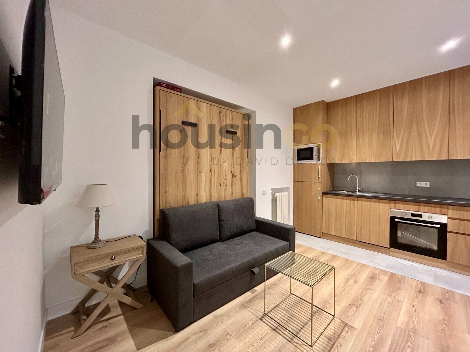 Sala d'estar de Apartament de lloguer en  Madrid Capital amb Aire condicionat, Calefacció i Moblat