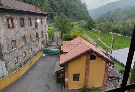Vista exterior de Casa o xalet en venda en Mieres (Asturias) amb Calefacció, Jardí privat i Terrassa