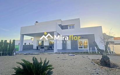 Vista exterior de Casa o xalet en venda en Els Poblets amb Aire condicionat, Jardí privat i Terrassa
