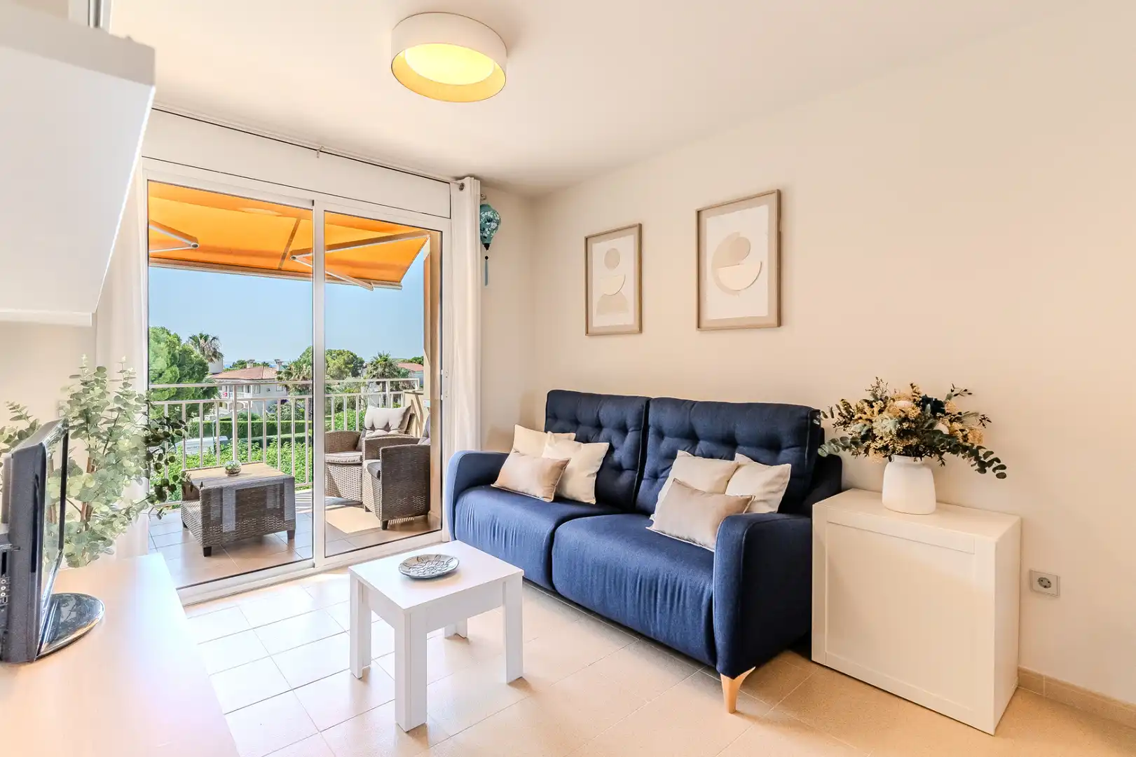 Sala de estar de Piso en venta en L'Ampolla con Aire acondicionado, Calefacción y Jardín privado