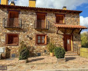 Vista exterior de Casa o xalet en venda en La Serna del Monte amb Calefacció, Jardí privat i Terrassa
