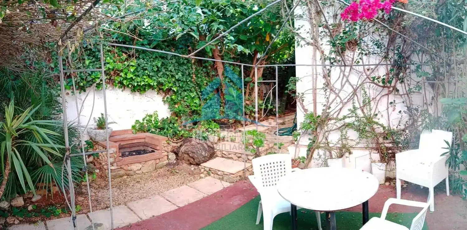 Jardí de Casa adosada en venda en Santa Eulària des Riu amb Terrassa