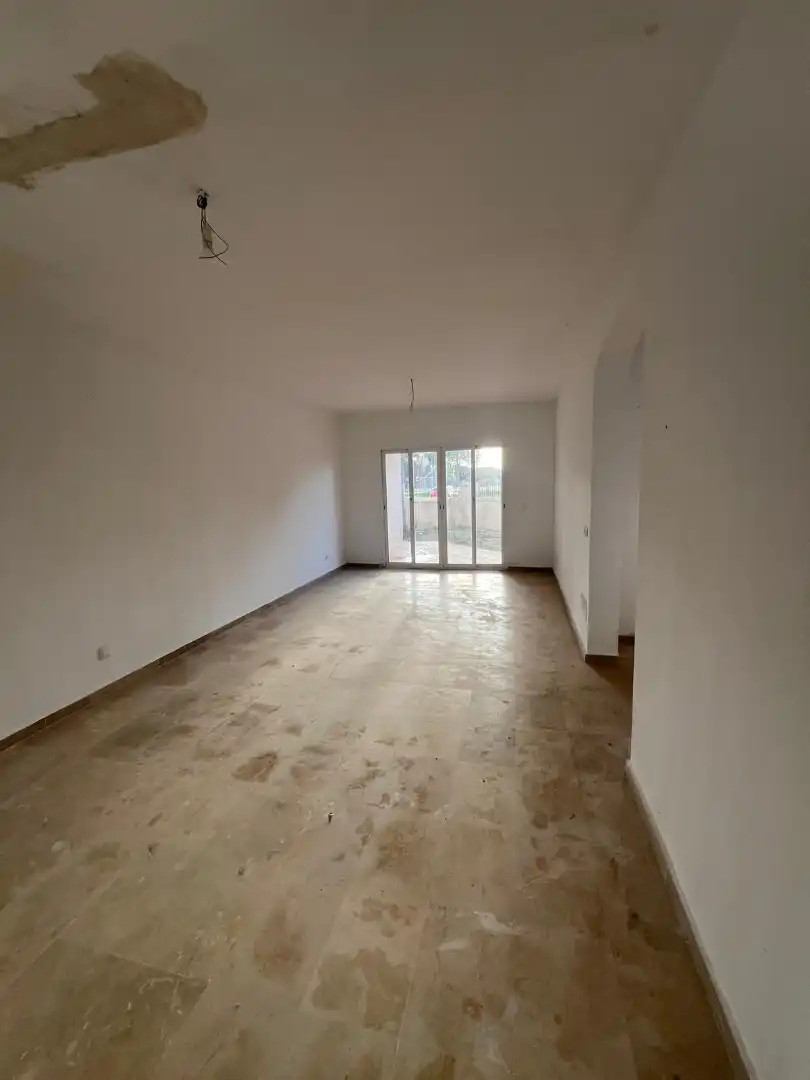 Sala d'estar de Casa adosada en venda en Llucmajor amb Jardí privat, Terrassa i Piscina