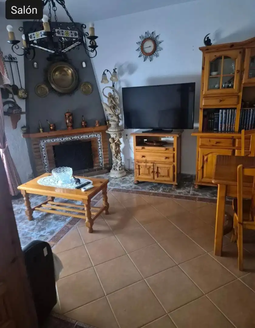Sala d'estar de Casa o xalet en venda en Costacabana - Loma Cabrera