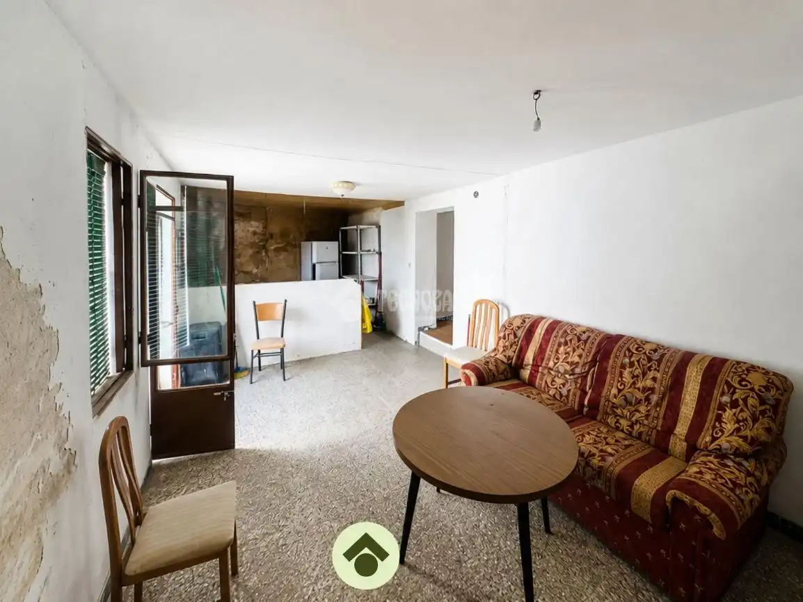 Sala d'estar de Casa adosada en venda en Bujalance amb Aire condicionat, Parquet i Moblat