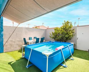 Swimming pool of Single-family semi-detached for sale in Torrevieja  with Air Conditioner, Private garden and Furnished