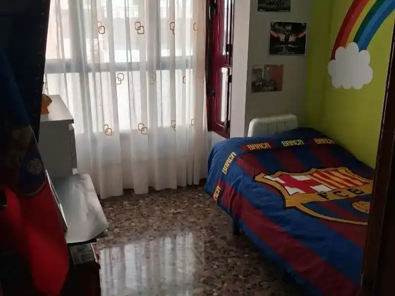 Dormitori de Casa adosada en venda en Sagunto / Sagunt amb Aire condicionat i Piscina