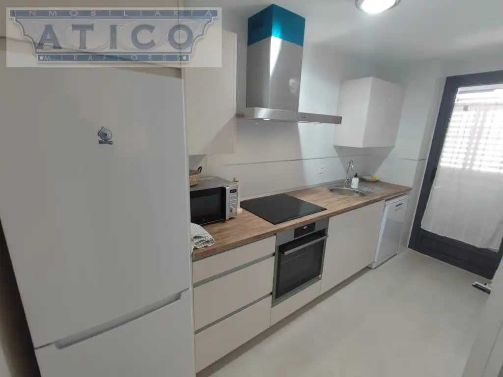 Cuina de Pis de lloguer en Montequinto amb Aire condicionat, Moblat i Forn