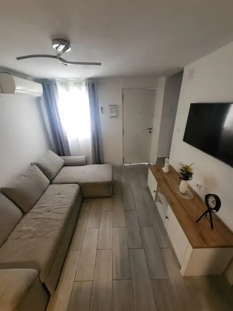 Sala de estar de Casa adosada en venta en Vinaròs con Aire acondicionado