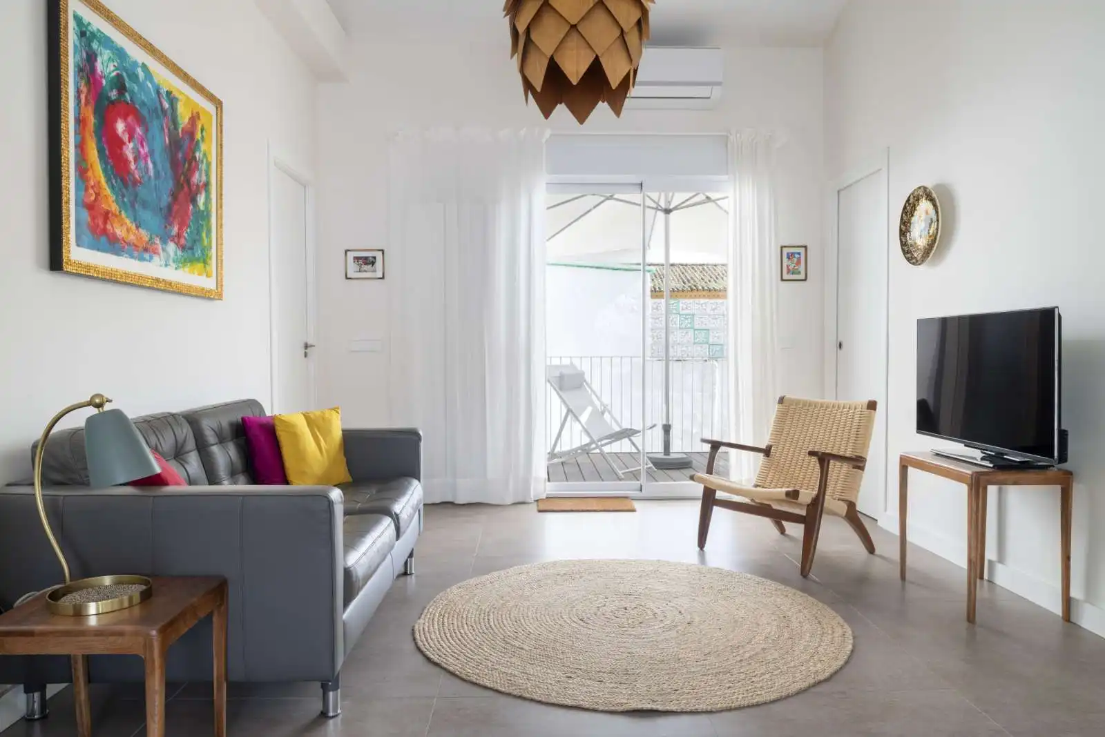 Sala d'estar de Apartament per a compartir en Sevilla amb Aire condicionat, Terrassa i Moblat