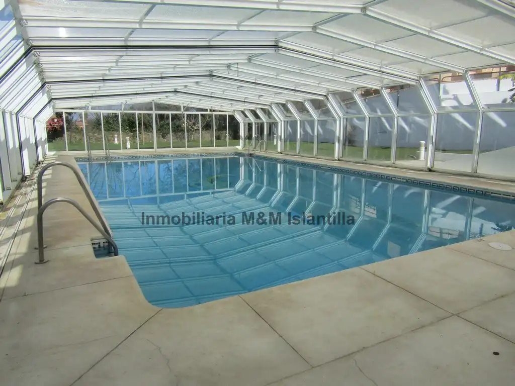 Piscina de Casa adosada en venta en Islantilla con Terraza, Trastero y Amueblado