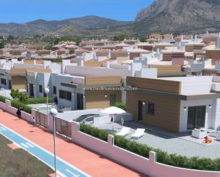 Vista exterior de Casa adosada en venda en Busot amb Terrassa i Piscina