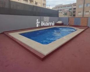 Swimming pool of Flat for sale in Torrevieja  with Air Conditioner, Heating and Terrace