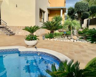 Swimming pool of House or chalet for sale in Calafell  with Air Conditioner, Heating and Private garden