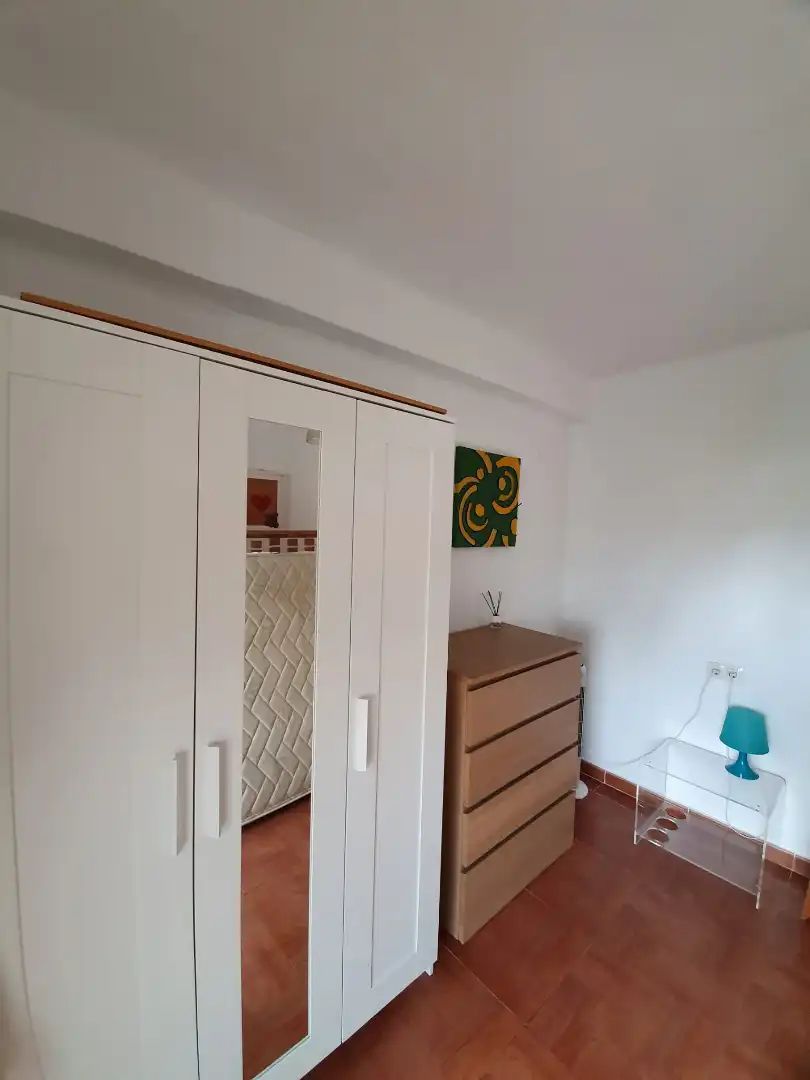 Dormitori de Apartament de lloguer en Torremolinos amb Moblat i Piscina comunitària