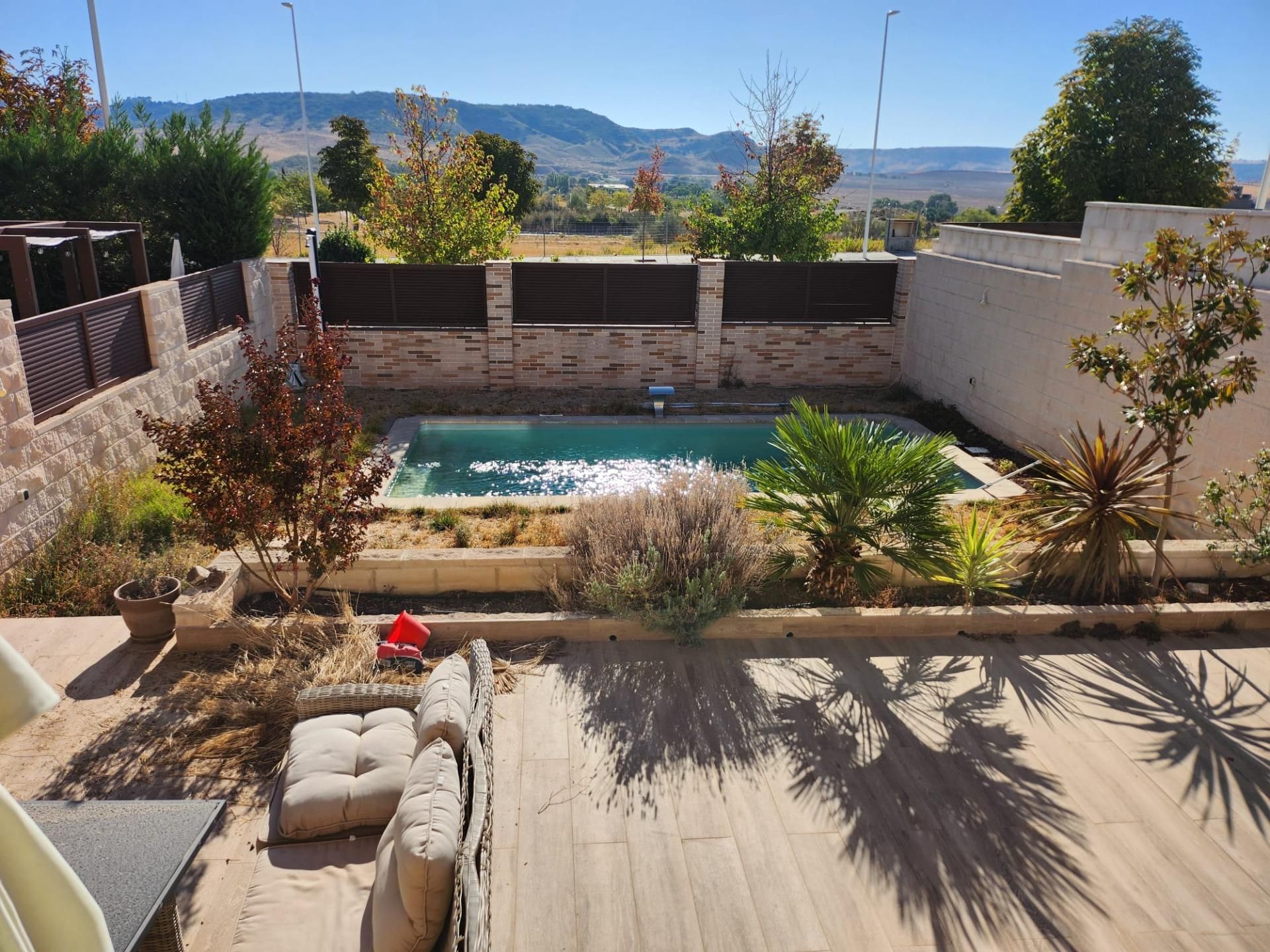 Piscina de Casa adosada en venda en Villalbilla amb Piscina