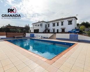 Swimming pool of House or chalet for sale in Las Gabias  with Air Conditioner, Heating and Parquet flooring