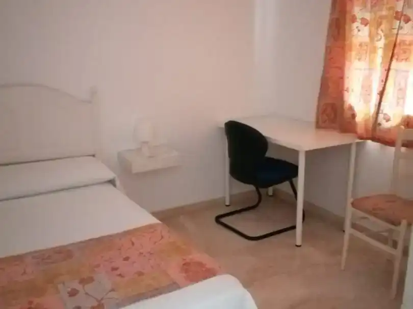 Schlafzimmer von Wohnung zur Miete in Osuna mit Klimaanlage, Privatgarten und Möbliert
