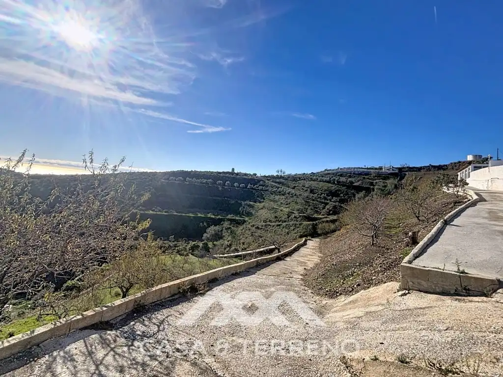 Vista exterior de Casa o chalet en venta en Macharaviaya con Aire acondicionado, Jardín privado y Terraza
