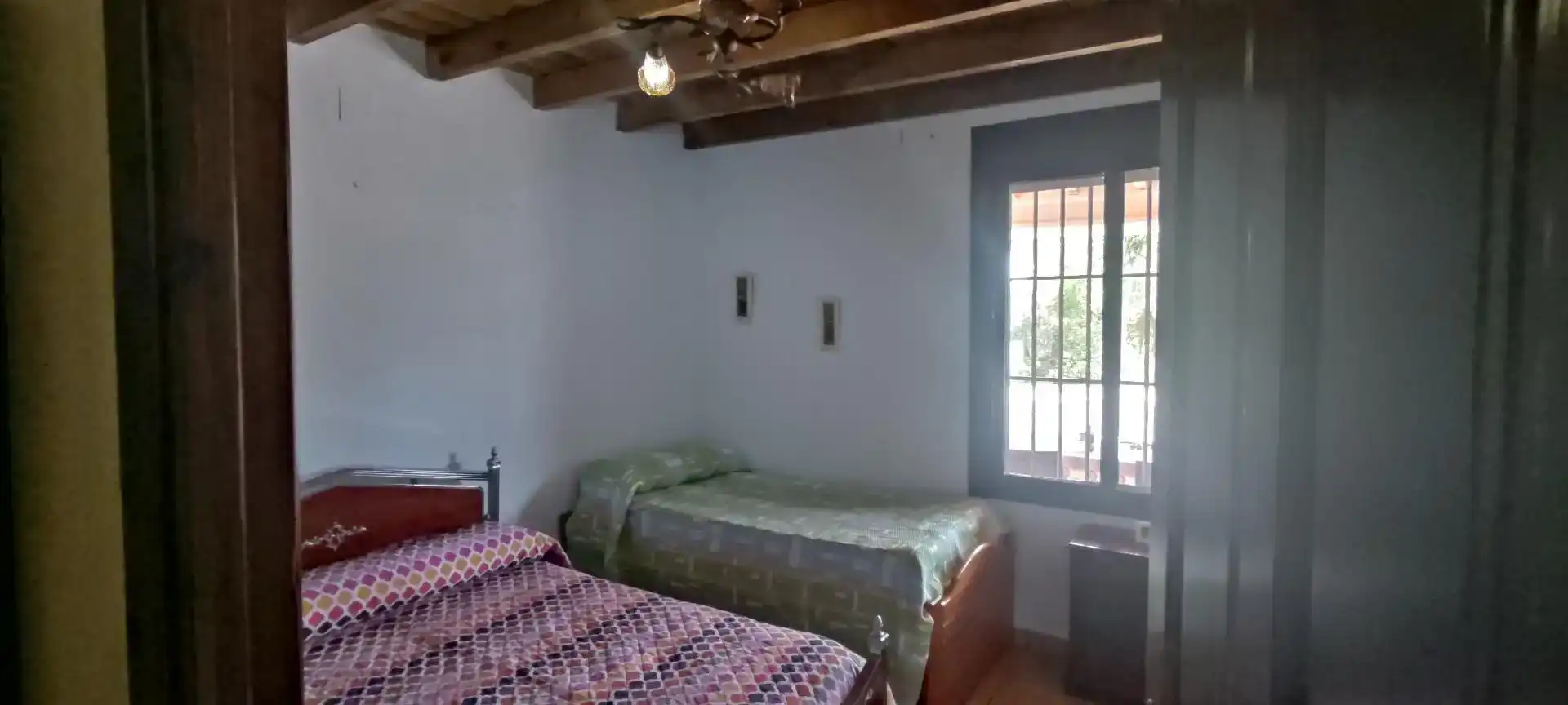 Dormitori de Finca rústica en venda en El Coronil amb Aire condicionat, Jardí privat i Piscina