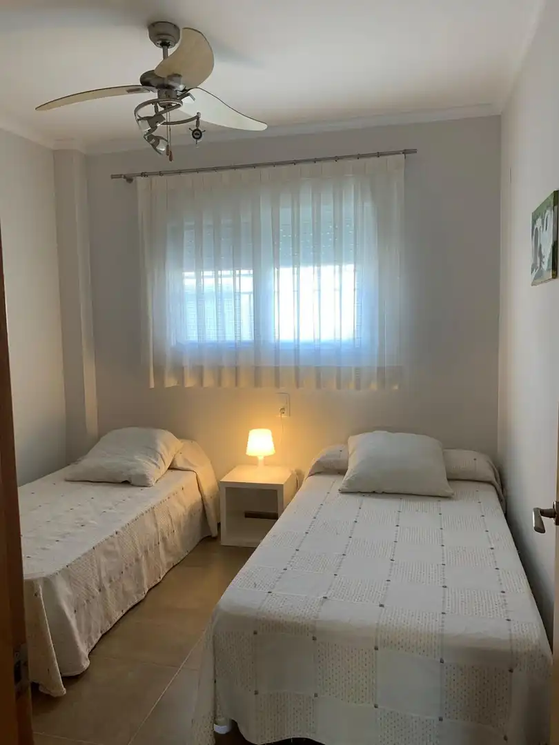 Schlafzimmer von Einfamilien-Reihenhaus zur Miete in Cullera mit Klimaanlage, Terrasse und Abstellraum