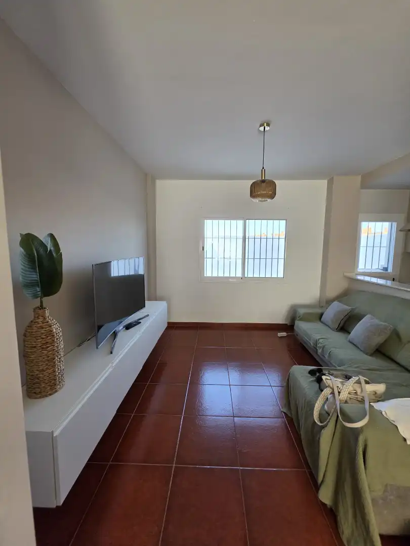 Sala de estar de Casa adosada en venta en Campillos con Jardín privado, Terraza y Amueblado