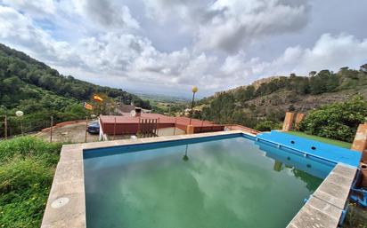 Swimming pool of House or chalet for sale in Alzira  with Air Conditioner, Private garden and Terrace