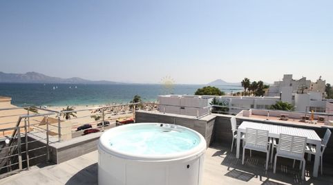 Apartamento de 2 habitaciones en segunda línea en Puerto Pollensa con terraza, jacuzzi y barbacoa