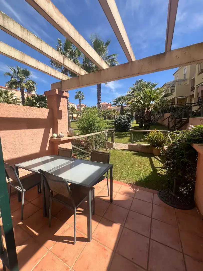 Terraza de Casa adosada en venta en Islantilla con Jardín privado, Trastero y Piscina comunitaria