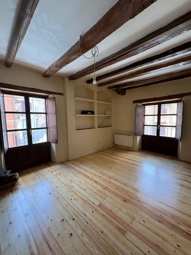 Sala d'estar de Casa adosada en venda en Simancas amb Calefacció, Jardí privat i Parquet