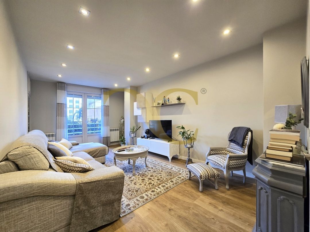 Living room of Flat for sale in Gijón   with Heating, Storage room and Balcony