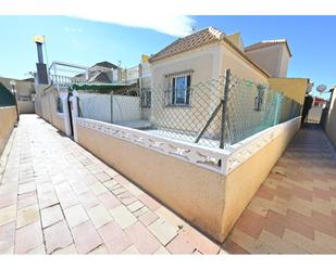 Exterior view of Single-family semi-detached for sale in Torrevieja  with Terrace and Swimming Pool