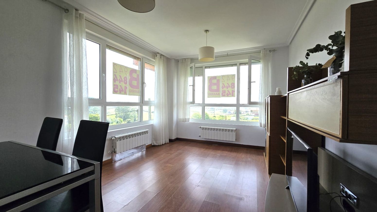 Sala d'estar de Pis en venda en Suances amb Calefacció, Jardí privat i Balcó