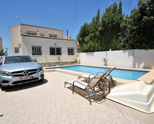 Swimming pool of House or chalet for sale in Torrevieja  with Air Conditioner, Heating and Private garden