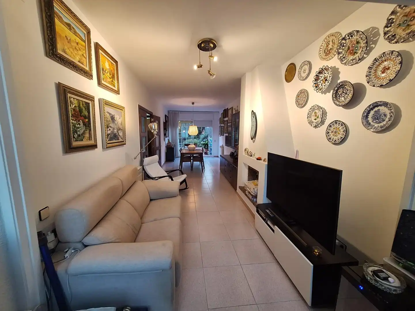 Sala de estar de Casa adosada en venta en Sabadell con Aire acondicionado, Jardín privado y Terraza