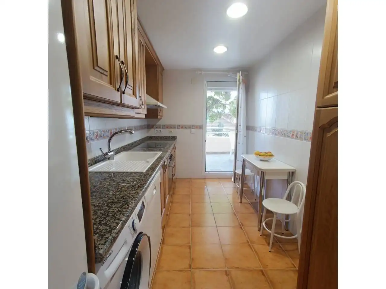 Kitchen of Apartments for rent in Benalmádena  with Terrace, Furnished and Alarm